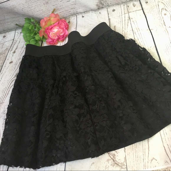 Elle Dresses & Skirts - Tiered black lace elastic waist mini skirt